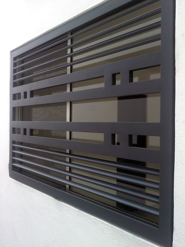 Grille de fenêtre grise design moderniste à barres